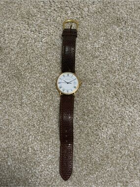 Vintage unisex Tiffany and Co watch with brown leather strap